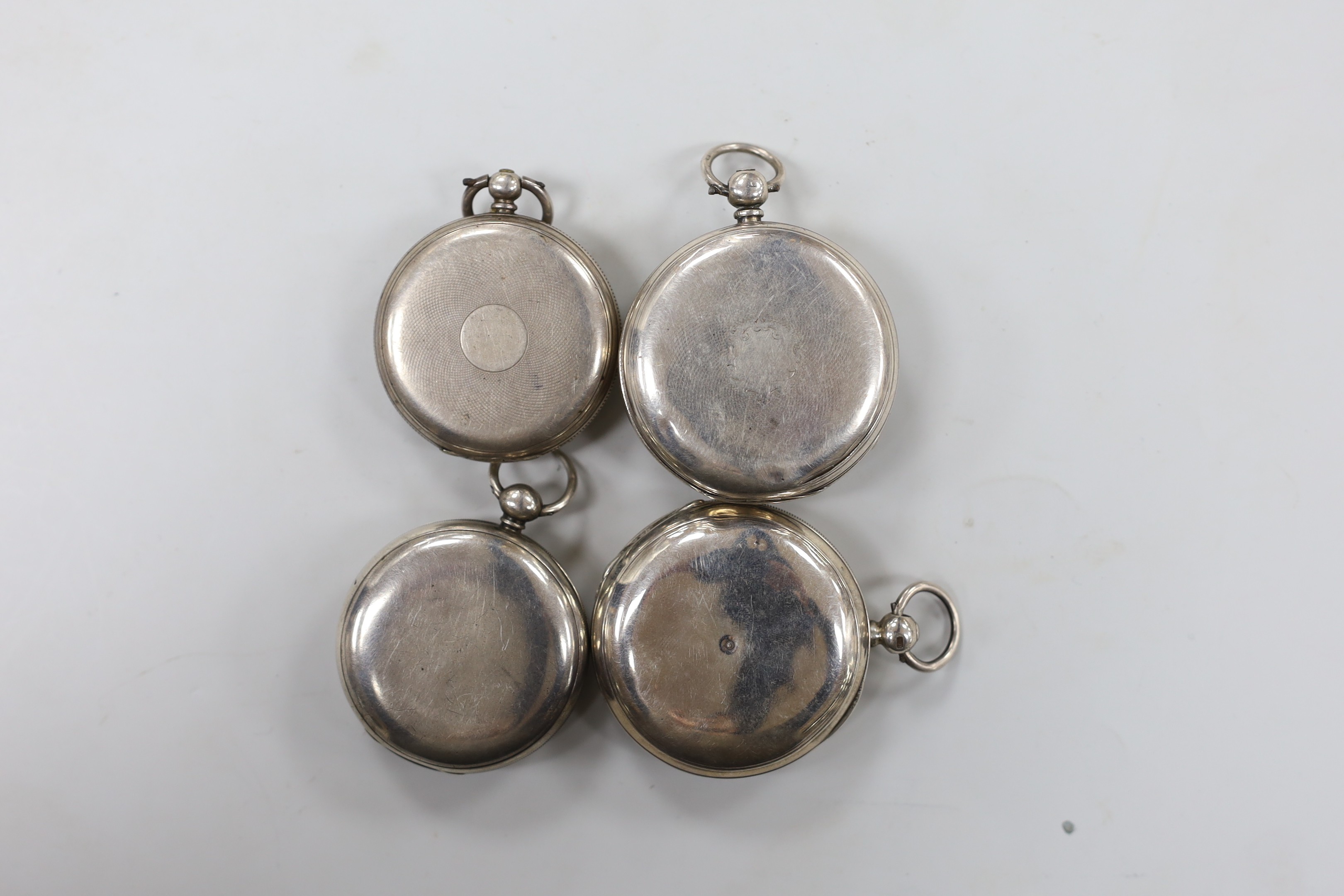 A late 19th century silver Waltham keywind hunter pocket watch, a 19th century silver open faced keywind pocket watch by Joseph Pentington, Swerpool, one other by Purves of Middleton and one other later Swiss white metal